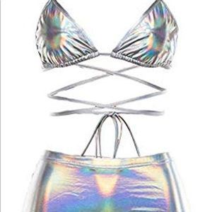 Shiny metallic, bikini top and mini skirts.